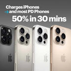 Four Apple iPhones with a focus on charging capabilities on a gray background