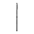 A side profile view of a dark gray tablet device, showing the thin edge, speaker grilles, and charging port on a plain white background.