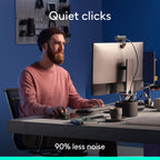 Person sitting at a desk with computer equipment, text 'Quiet clicks' and '90% less noise'.