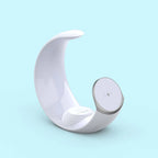 A white curved magnetic wireless charging stand with a circular charging pad, shown on a light blue background.
