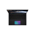 A black Lenovo gaming laptop shown open from a top-down perspective, featuring an RGB backlit keyboard, a vibrant iridescent touchpad, and a display screen showing a space-themed wallpaper.