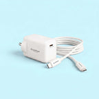 A white Stuftool USB-C fast charger with its matching USB-C cable coiled behind it, set against a solid light blue background.