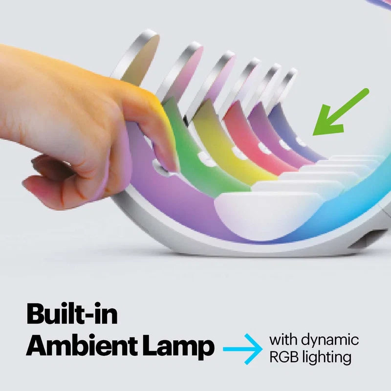 A hand slides a translucent colored panel into a curved device with multiple rainbow-colored light channels, with text reading 'Built-in Ambient Lamp' and 'with dynamic RGB lighting' on a light gray background.