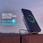 Wireless charging power bank with smartphone on a wooden surface against a sky background