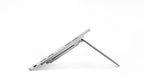A silver Microsoft Surface Pro tablet shown at an angle with its kickstand extended, on a clean white background.