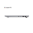 A silver laptop shown from the side on a white background, with the Copilot+PC logo above it.