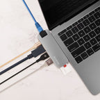 Cadyce CA-DUCDG Dual USB‑C Docking Station packaging displayed beside the device