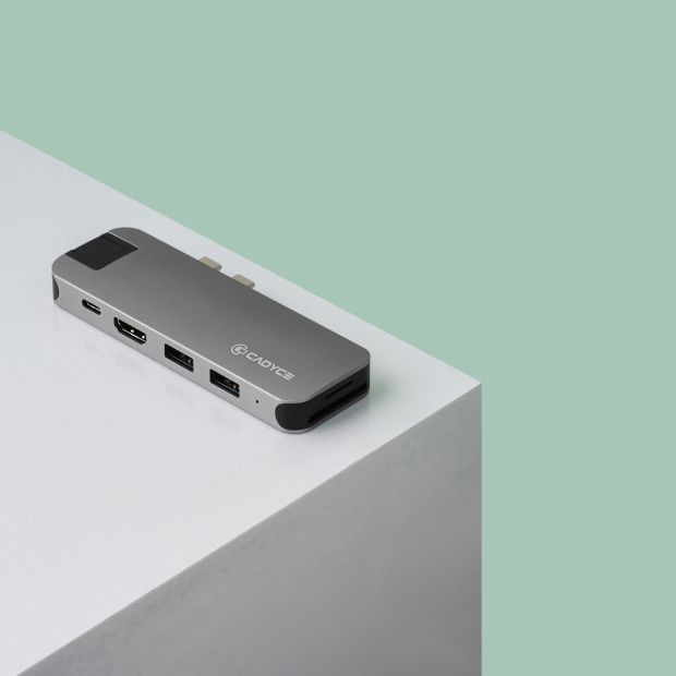 Cadyce CA-DUCDG Dual USB‑C Docking Station lifestyle shot on a desk