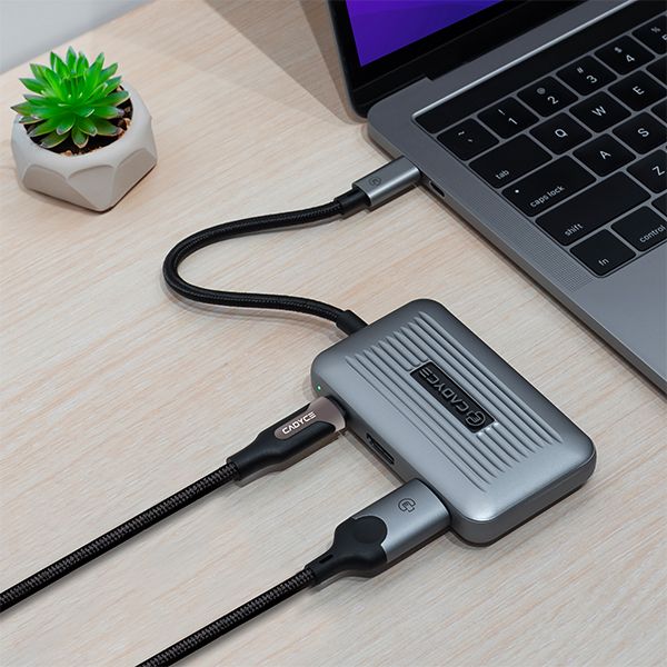 CADYCE CA-DUHD4K USB‑C to Dual HDMI adapter displaying its two HDMI ports