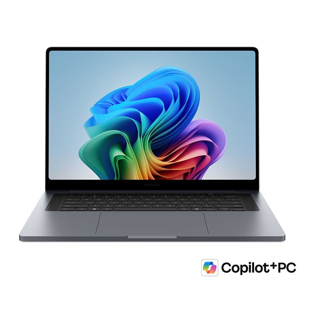 A silver laptop shown open against a white background, with a colorful abstract wallpaper on the screen and a Copilot+PC logo in the bottom right corner.