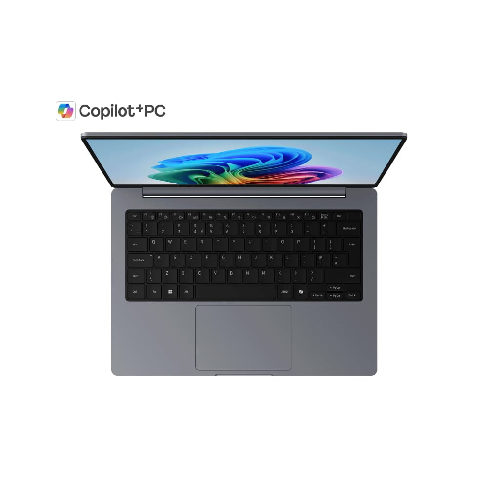 A gray Microsoft Surface laptop shown open from a front-facing angle on a white background, with the Copilot+PC logo printed above the screen.