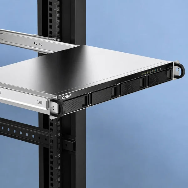 A QNAP network storage server mounted on a black metal rack shelf, shown from a three-quarters angle against a solid blue background.