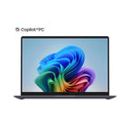 A dark gray Copilot+PC laptop shown open on a white background, with the Copilot+PC logo printed above the screen. The screen displays a colorful abstract wallpaper.